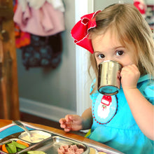 Load image into Gallery viewer, a little girl is drinking from a stainless steel cup with handle
