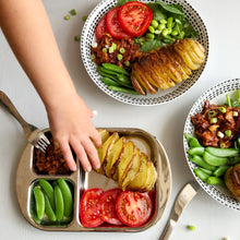 Load image into Gallery viewer, A child reaches for potatoes from a Kiddobloom stainless steel divided tray. Potatoes, Tomato slices, ground vegan meat, and sugar snap peas are served on Kiddobloom baby stainless steel divided tray
